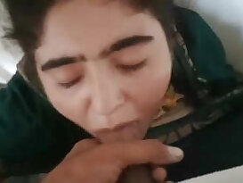 A stunning Pakistani woman enjoys taking cum in her mouth